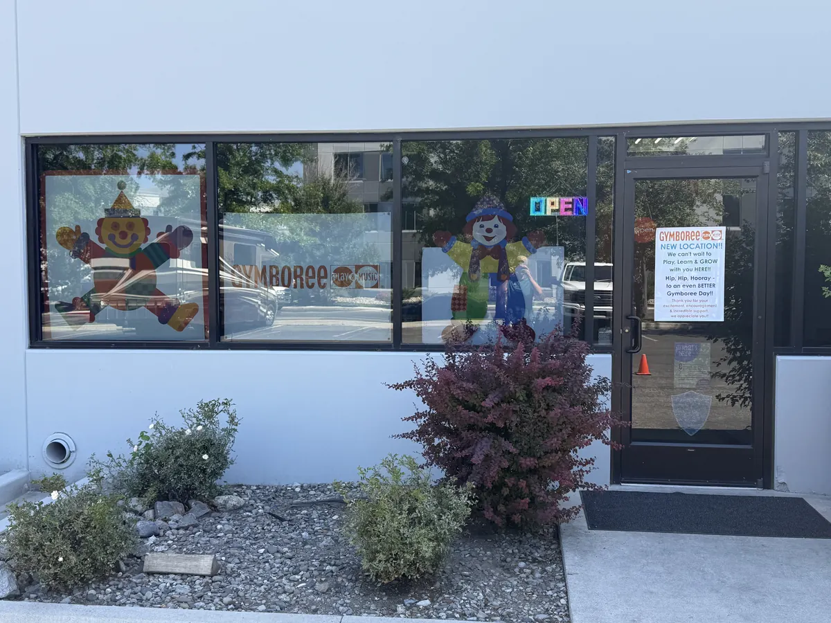 Gymboree storefront with character graphics and the Gymboree logo across the front windows