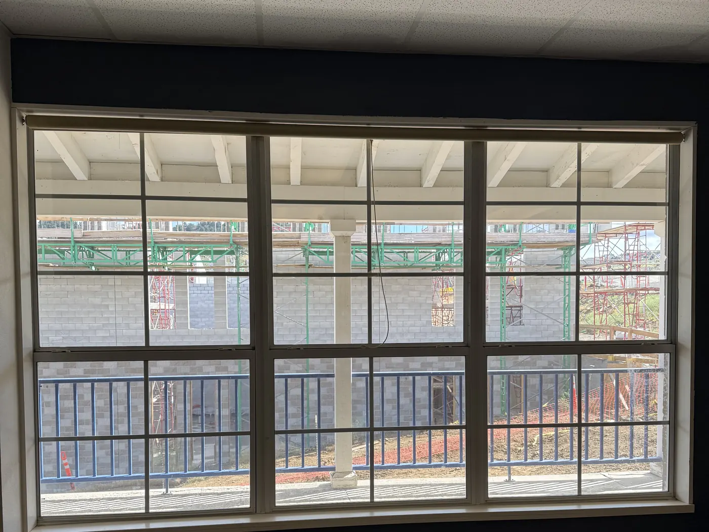 Virginia City High School library windows before, looking at a construction site
